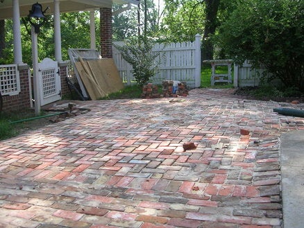 Brick Patio with mill stone accents