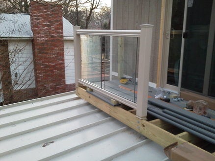 1:12 pitch roof with balcany and glass railing