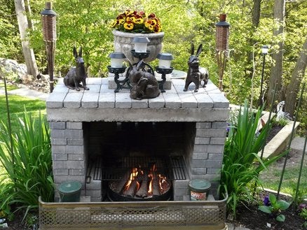 adding an outdoor fireplace